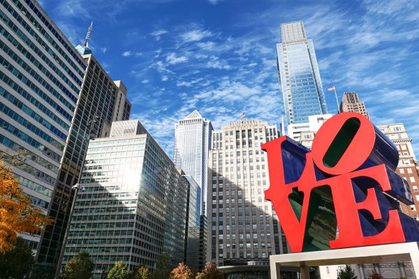 Philadelphia skyline with "Love" Philadelphia USA, photographed on October 28, 2022. The Love sculpture is on public display. It is a famous monument by Robert Indiana located in the center city Phildelphia at JFK Plaza