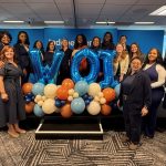 Women of Independence group photo with balloons