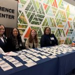 Women of Independence conference group picture of check-in table