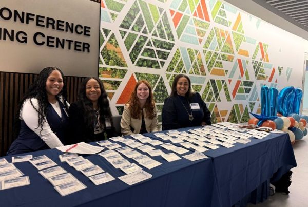 Women of Independence conference group picture of check-in table