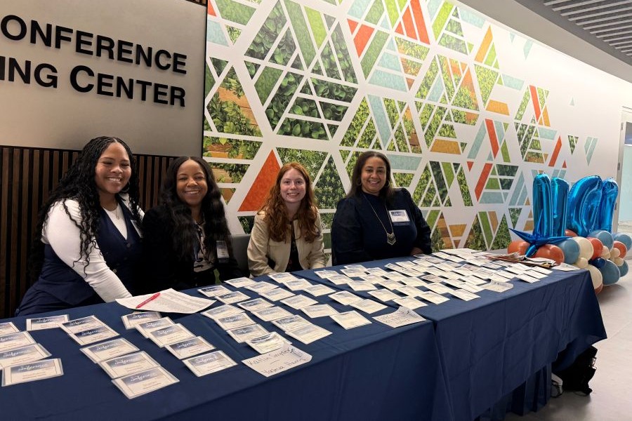 Women of Independence conference group picture of check-in table